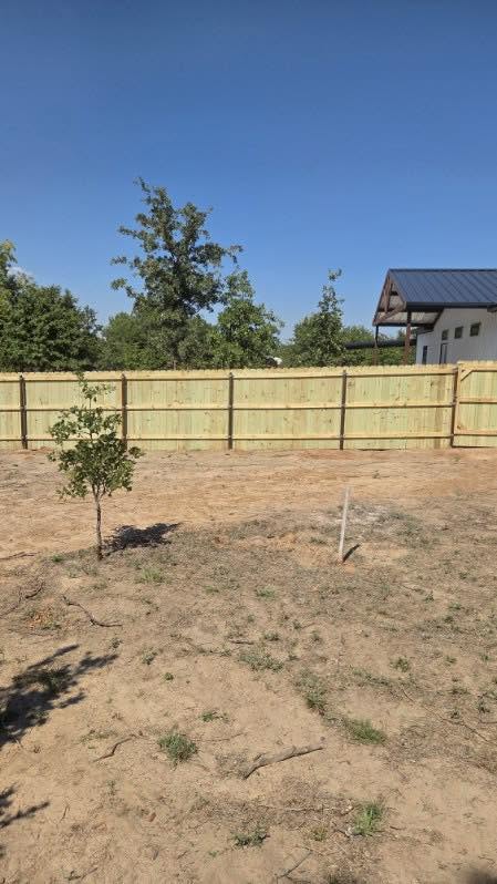 Custom residential privacy fence built by Lonestar Fencing & Welding in Texas