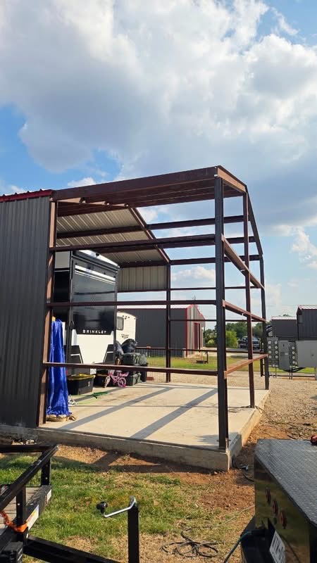 Side view of an RV carport steel frame under construction for a Texas property